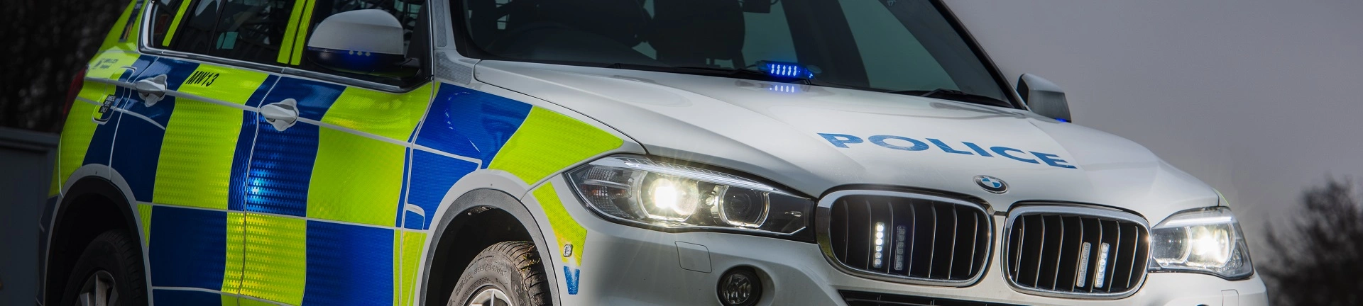 West Midlands Police car to illustrate story about a man who died after being hit by a force vehicle responding to a 999 call